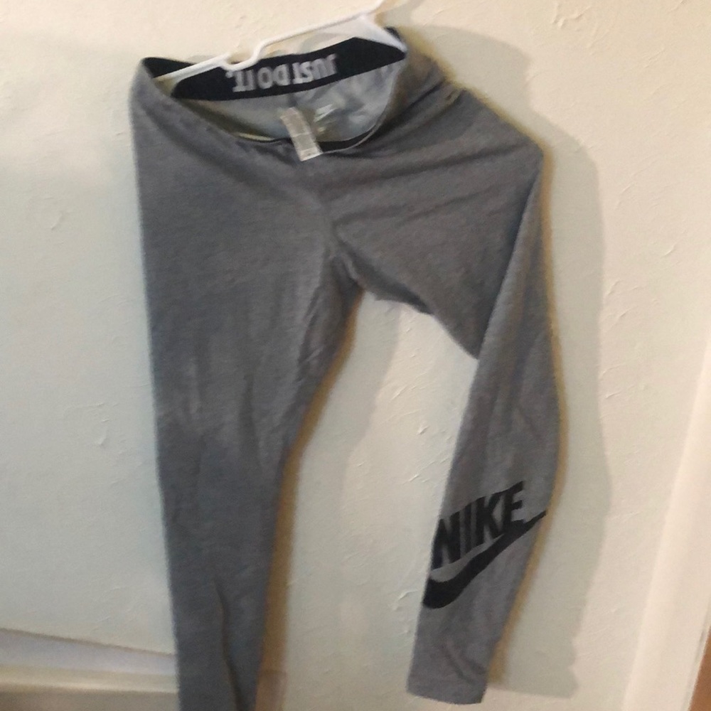 Nike woman’s leggings/sweat pants, size S